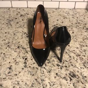 Black pointed toe heels
